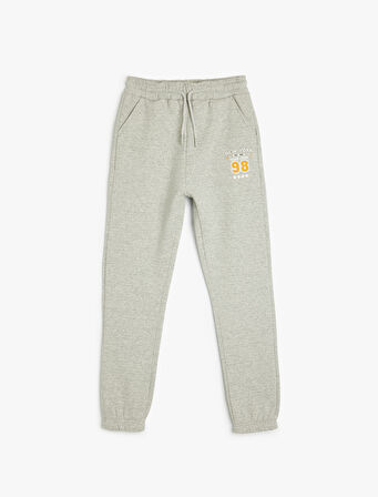 Cep Detaylı Beli Bağlamalı Baskılı Şardonlu Jogger Eşofman Altı