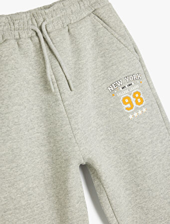 Cep Detaylı Beli Bağlamalı Baskılı Şardonlu Jogger Eşofman Altı