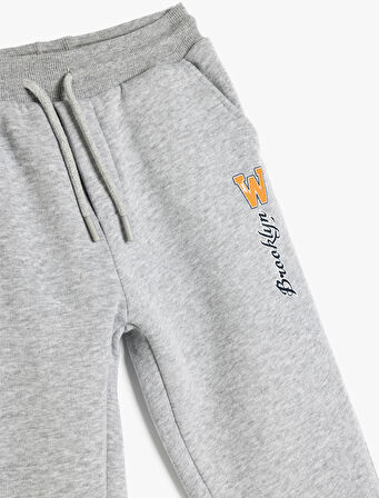 Baskı Detaylı Cepli Beli Bağlamalı Pamuklu Şardonlu Eşofman Altı 