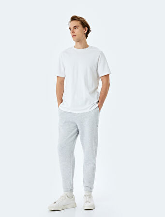 Pamuk Karışımlı Cepli Dikiş Detaylı Şardonlu Lastikli Paça Beli Bağcıklı Jogger Eşofman Altı