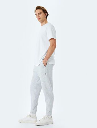 Pamuk Karışımlı Cepli Dikiş Detaylı Şardonlu Lastikli Paça Beli Bağcıklı Jogger Eşofman Altı