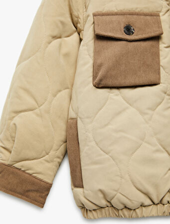 Uzun Kollu Cep Detaylı Dik Yaka Kapitone Ceket