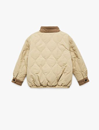 Uzun Kollu Cep Detaylı Dik Yaka Kapitone Ceket