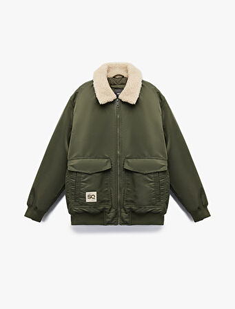 Uzun Kollu Cepli Etiket Detaylı Peluş Yaka Mont