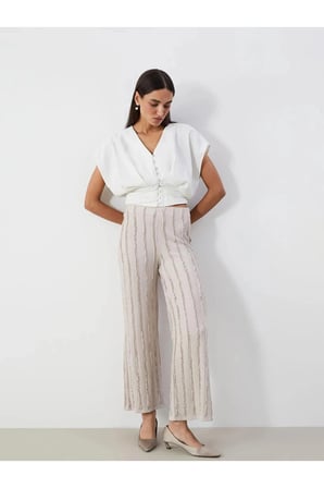 LCWAIKIKI Classic BEJ Beli Lastikli Dokulu Geniş Paça Kadın Pantolon