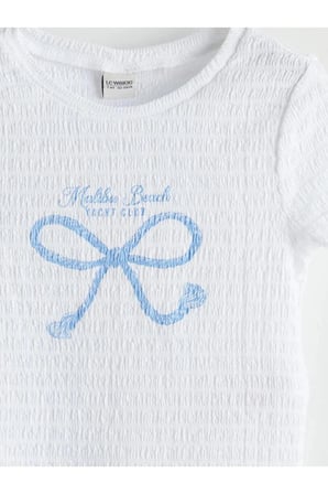 LCW Kids Beyaz Bisiklet Yaka Fiyonk Baskılı Kız Çocuk Crop Tişört