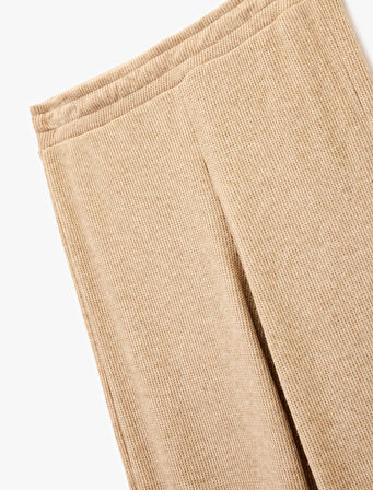 Beli Lastikli Düz Bol Paça Dokulu Pantolon