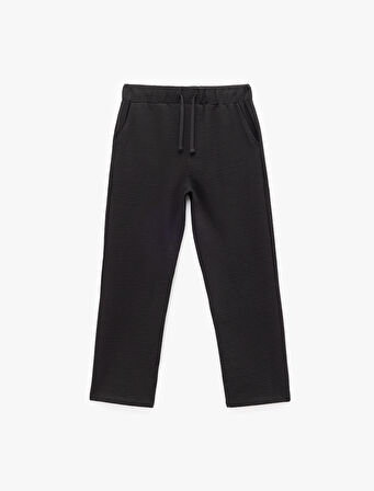 Pamuklu Dokulu Cep Detaylı Beli Bağcıklı Eşofman Altı