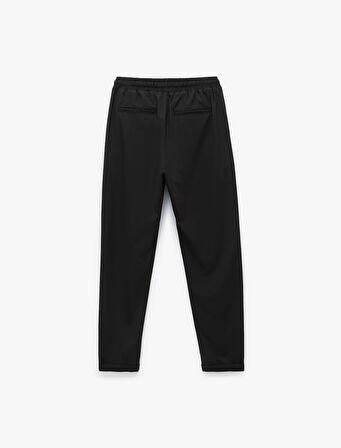 Beli Bağcıklı Katlamalı Paça Rahat Kesim Cep Detaylı Slim Fit Pantolon
