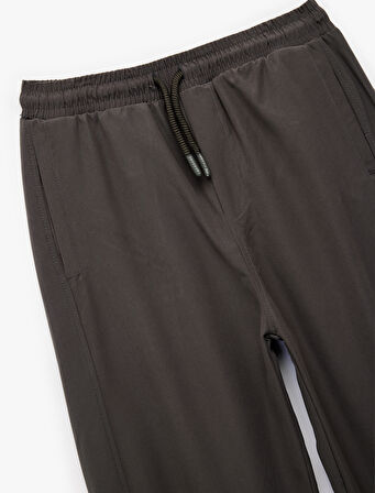 Cepli Beli Lastikli Bağlamalı Loose Fit Jogger Paraşüt Pantolon