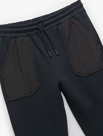 Cep Detaylı Şardonlu Beli Bağlamalı Pantolon Görünümlü Eşofman Altı