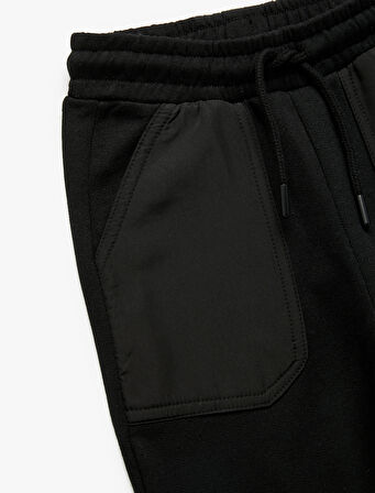 Cep Detaylı Şardonlu Beli Bağlamalı Pantolon Görünümlü Eşofman Altı