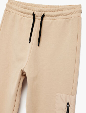 Üç İplik Şardonlu Baskılı Fermuar Cepli Beli Bağcıklı Jogger Eşofman Altı