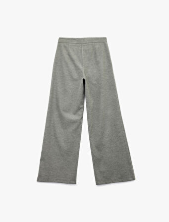 Cepli Piliseli Geniş Paça Kumaş Pantolon