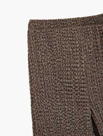 Beli Lastikli Dokulu Geniş Paça Pantolon