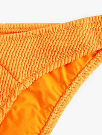 Asimetrik Bel Detaylı Dokulu Brazilian Bikini Altı