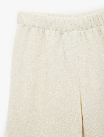 Beli Lastikli Viskon Karışımlı Dokulu Geniş Paça Pantolon