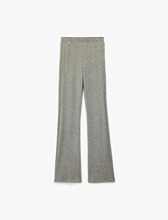 Beli Lastikli Düz Bol Paça Dokulu Pantolon