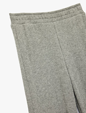 Beli Lastikli Düz Bol Paça Dokulu Pantolon