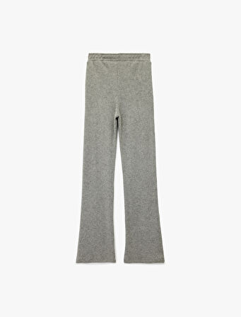 Beli Lastikli Düz Bol Paça Dokulu Pantolon