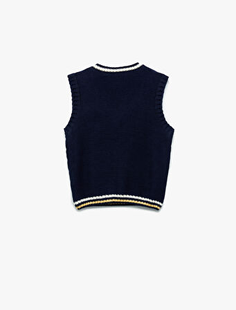 V Yaka Örgü Dokulu Fiyonk Detaylı Triko Süveter