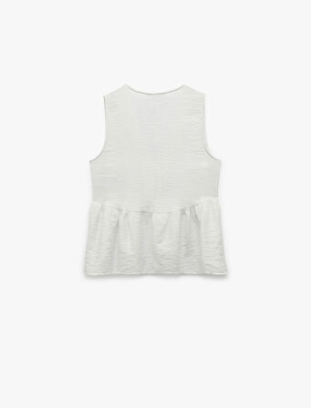 Koton X Melis Ağazat - Deniz Kabuğu Aksesuar Detaylı V Yaka Kolsuz Peplum Bluz