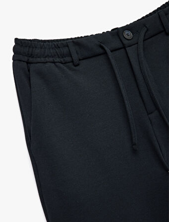 Beli Bağcıklı Düğmeli Pike Kumaş Cep Detaylı Duble Paça Slim Fit Pantolon