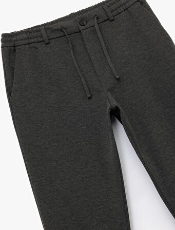 Beli Bağcıklı Düğmeli Pike Kumaş Cep Detaylı Duble Paça Slim Fit Pantolon