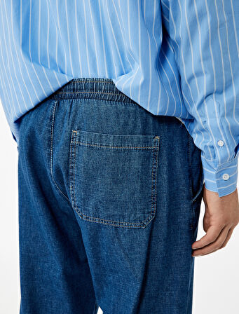 Pamuklu Cep Detaylı Beli Bağcıklı Bol Kalıp Jean Pantolon