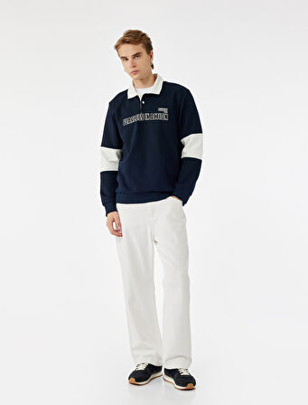 Uzun Kollu Renk Kontrastlı Baskılı Polo Yaka Sweatshirt