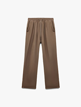 Viskon Cupro Kumaş Beli Bağcıklı Cepli Bol Paça Pantolon