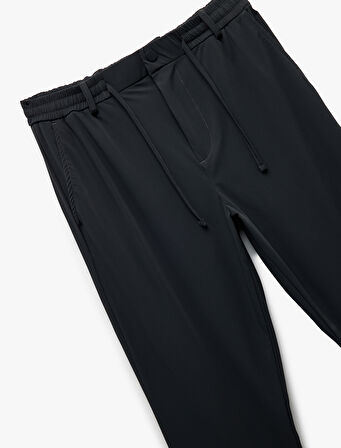Katlamalı Paça Beli Bağcıklı Düğmeli Esnek Slim Fit Pantolon
