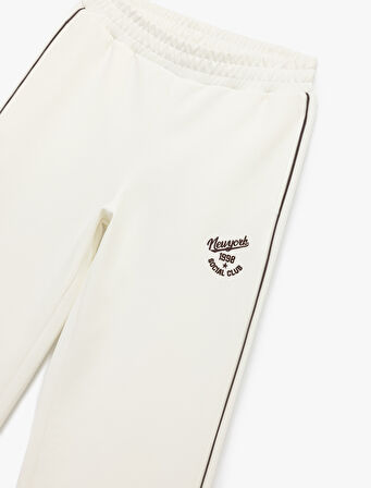 Pamuklu Şardonlu Biyeli Baskılı Beli Lastikli Geniş Paça Eşofman Altı