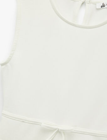 Slim Fit Bisiklet Yaka Volanlı Fiyonklu Kolsuz Bluz