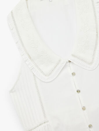 Nakış Detaylı Düğmeli Kolsuz Bebe Yaka Viskon Bluz