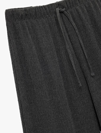 Bürümcük Kumaş Rahat Kalıp Beli Bağcıklı Düz Bol Paça Pantolon