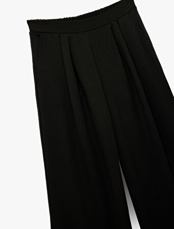 Bürümcük Kumaş Cepli Pileli Düz Bol Paça Palazzo Pantolon