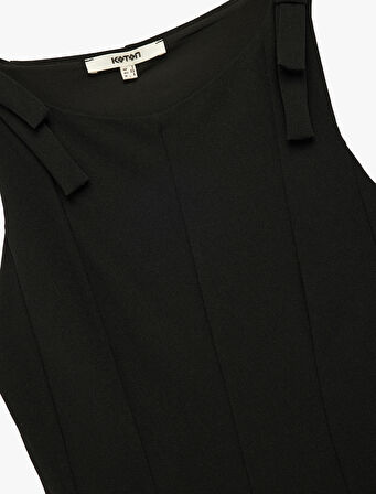 Krep Scuba Kumaş Slim Fit Kolsuz Kayık Yaka Fiyonk Detaylı Peplum Bluz