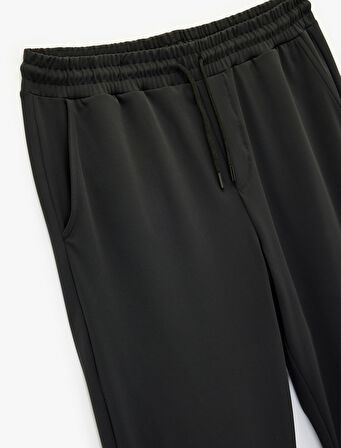 Rahat Kalıp Cepli Beli Bağcıklı Geniş Paça Spor Eşofman Altı