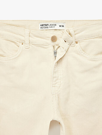 Dar Kesim Düğmeli Cepli İspanyol Paça Jean Pantolon - Flare Jeans