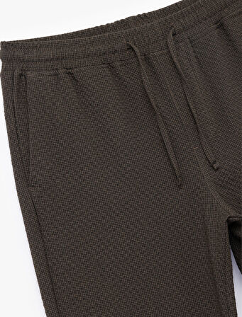 Viskon Karışımlı Cep Detaylı Dokulu Beli Bağcıklı Pantolon