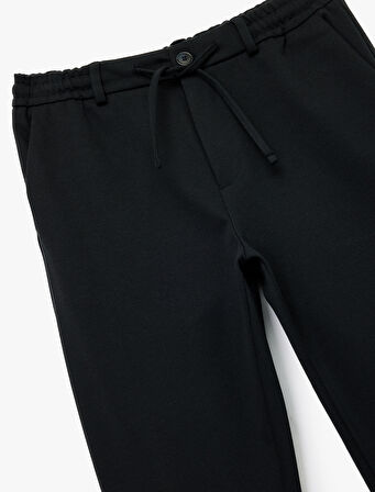 Cep Detaylı Düğmeli Pike Kumaş Beli Bağcıklı Pantolon