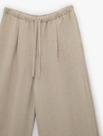 Keten Görünümlü Beli Bağcıklı Geniş Paça Pantolon