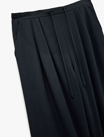 Beli Bağlamalı Cepli Geniş Paça Kumaş Baggy Pantolon