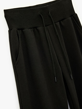 Rahat Kalıp Yüksek Bel Bağcıklı Cep Detaylı Geniş Paça Eşofman Altı