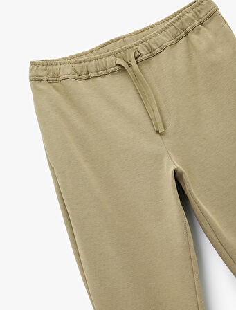 Cep Detaylı Katlamalı Paça Rahat Kesim Beli Bağcıklı Pantolon