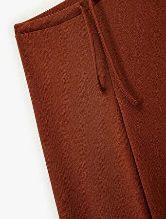 Beli Lastikli Bağlamalı Dokulu Uzun Geniş Paça Pantolon