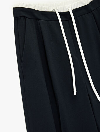 Beli Bağcıklı Geniş Paça Pantolon