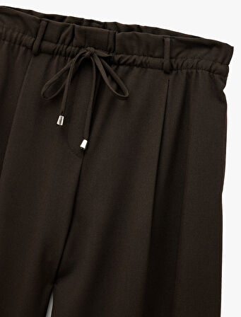 Beli Bağcıklı Bağlamalı Cepli Düz Geniş Paça Kumaş Pantolon