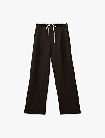 Cepli Pile Detaylı Beli Bağcıklı Geniş Paça Kumaş Pantolon